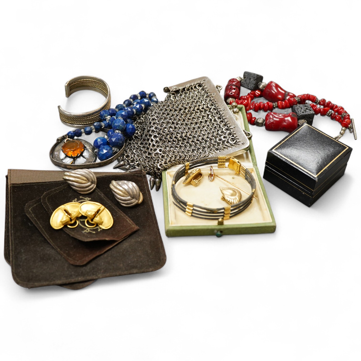 A collection of jewels, comprising: an early 20th century ruby, diamond and seed pearl stick pin, stamped 15ct, length 5.9cm, gross weight approximately 1.5 grams, one diamond deficient; together with a pair of ear clips